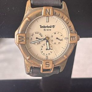 Timberland 50mm with brown leather band. Used but great condition. Classic!